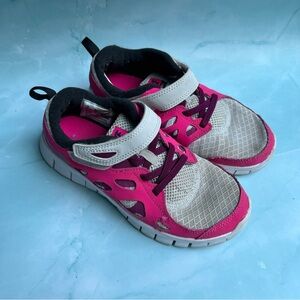 Nike Kids Pink and Gray free run 2